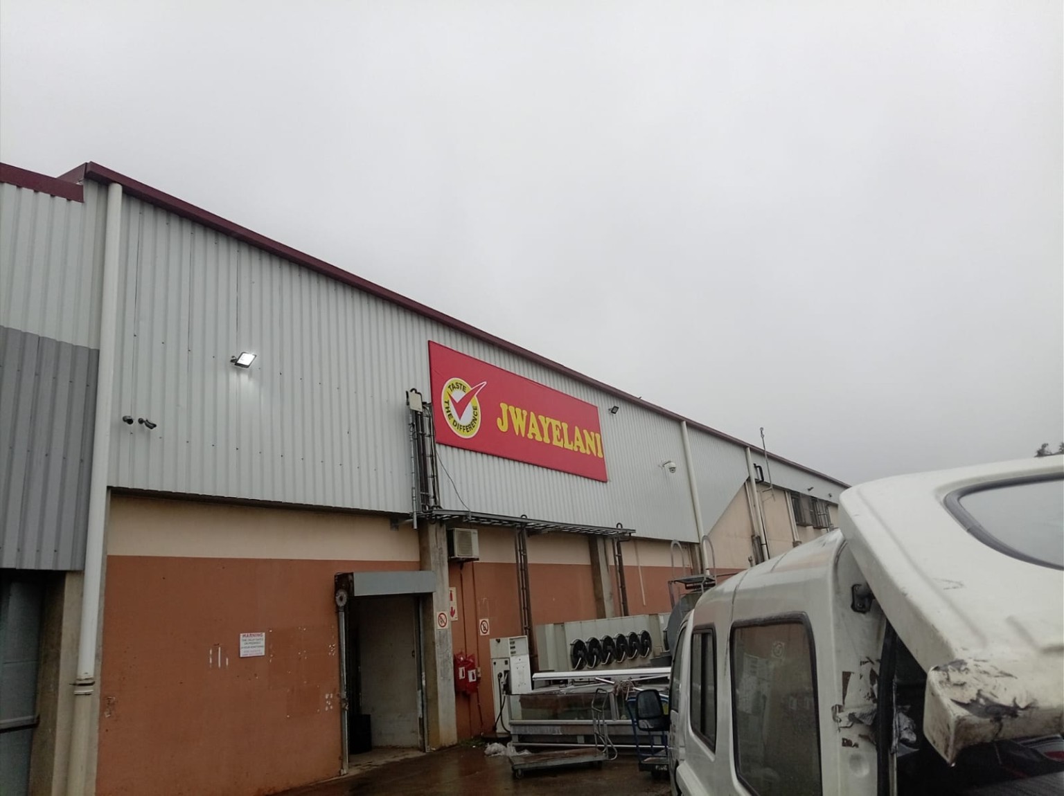 Jwayelani exterior signage installation