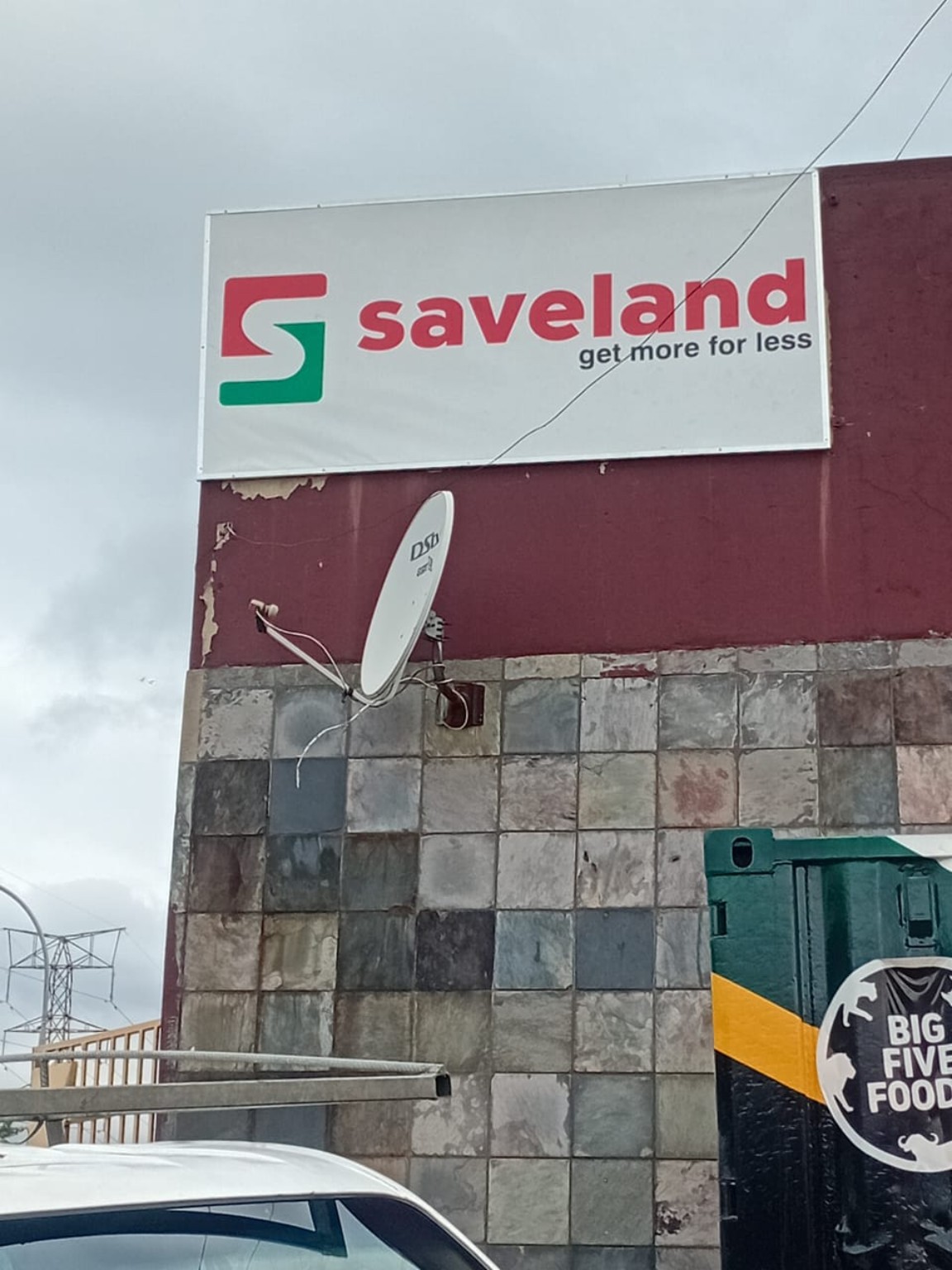 Saveland exterior sign
